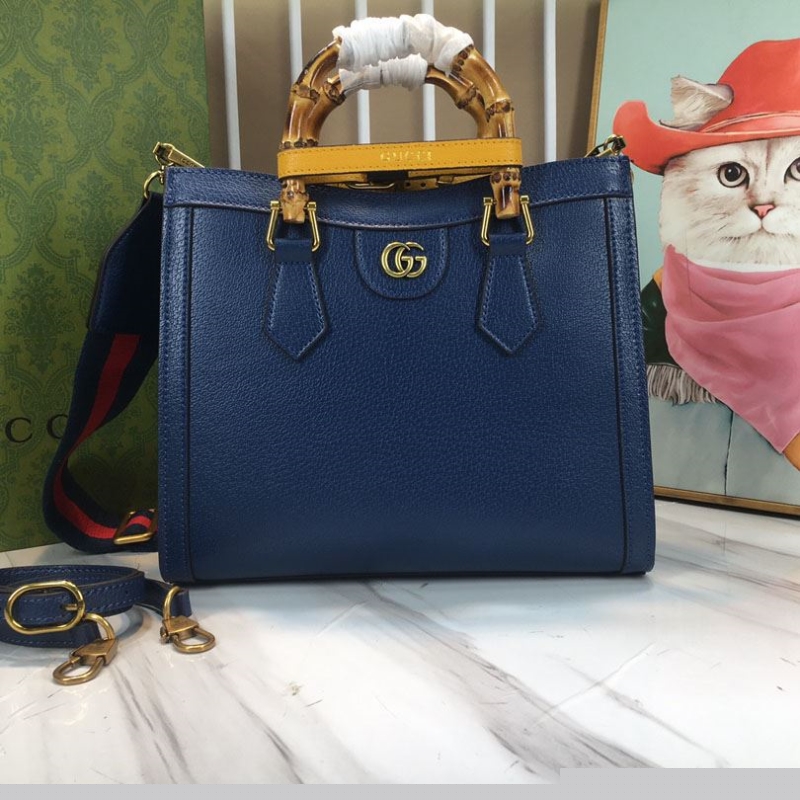 G*u*i shopping bags